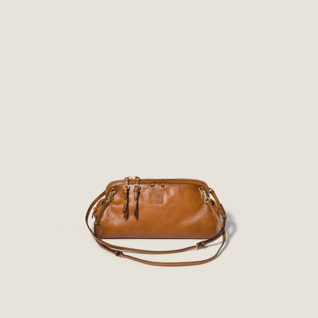 Miu Miu Caprice leather clutch Cognac