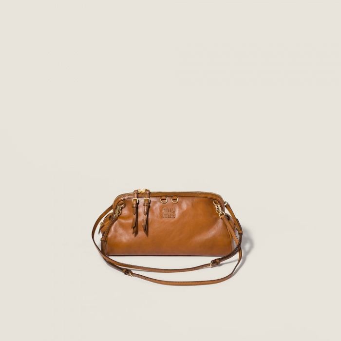 Miu Miu Caprice leather clutch Cognac