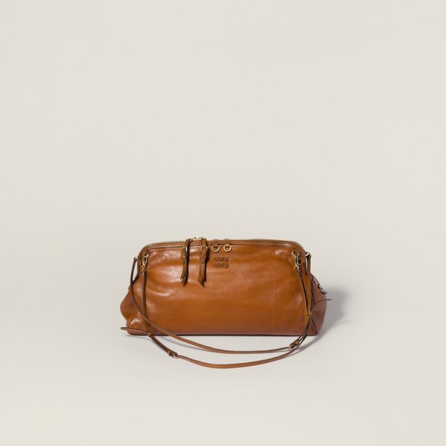 Miu Miu Caprice leather clutch Cognac