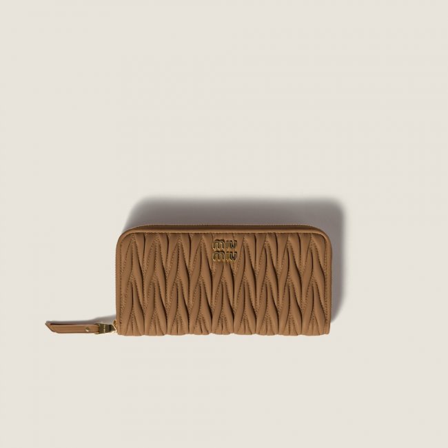 Miu Miu Large matelassé nappa leather wallet Caramel