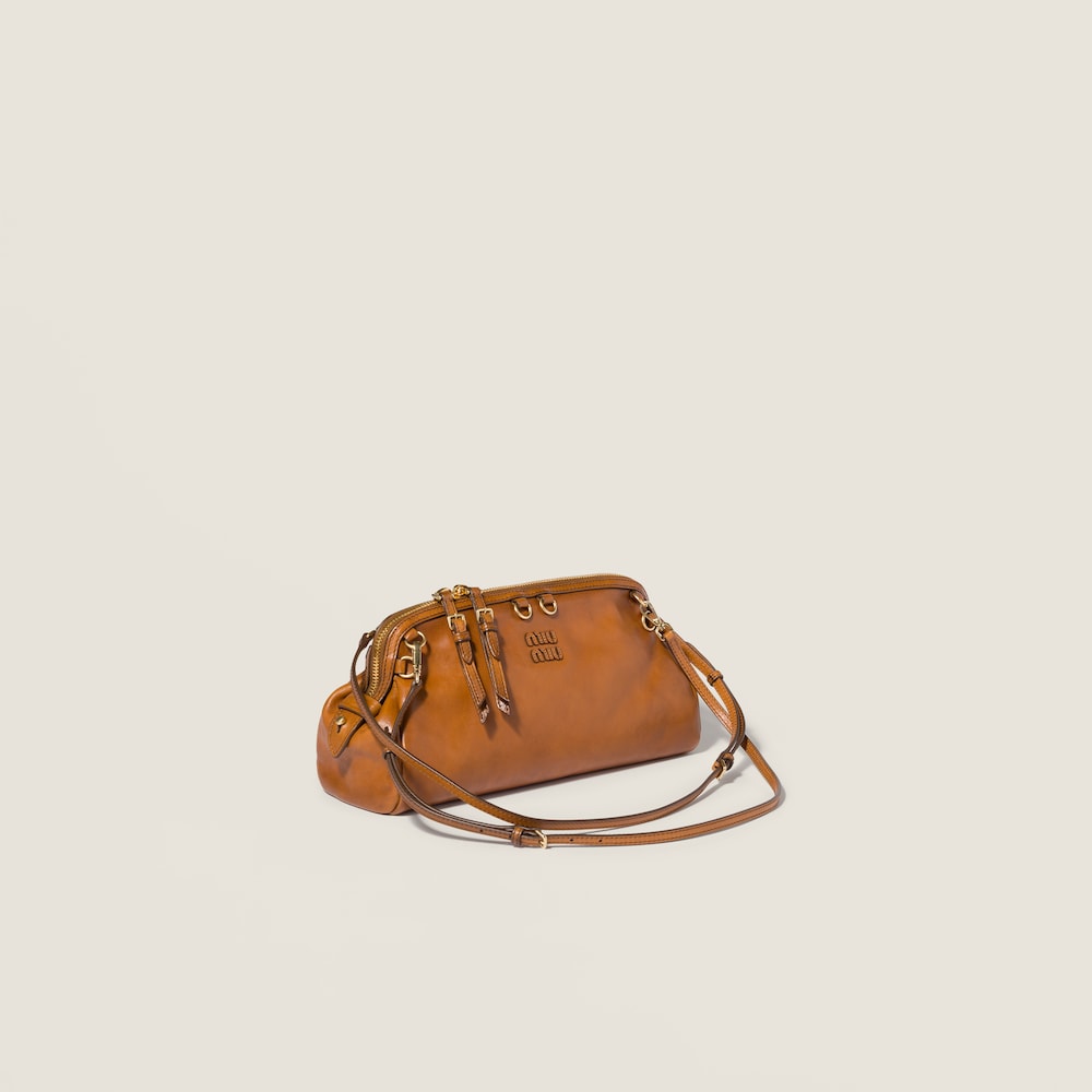 Miu Miu Caprice leather clutch Cognac