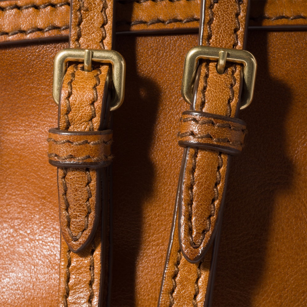 Miu Miu Caprice leather clutch Cognac