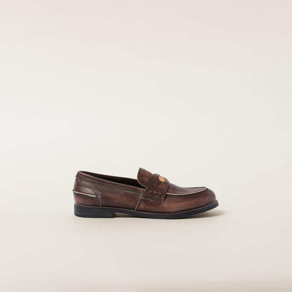 Miu Miu Vintage-effect leather penny loafers Ebony