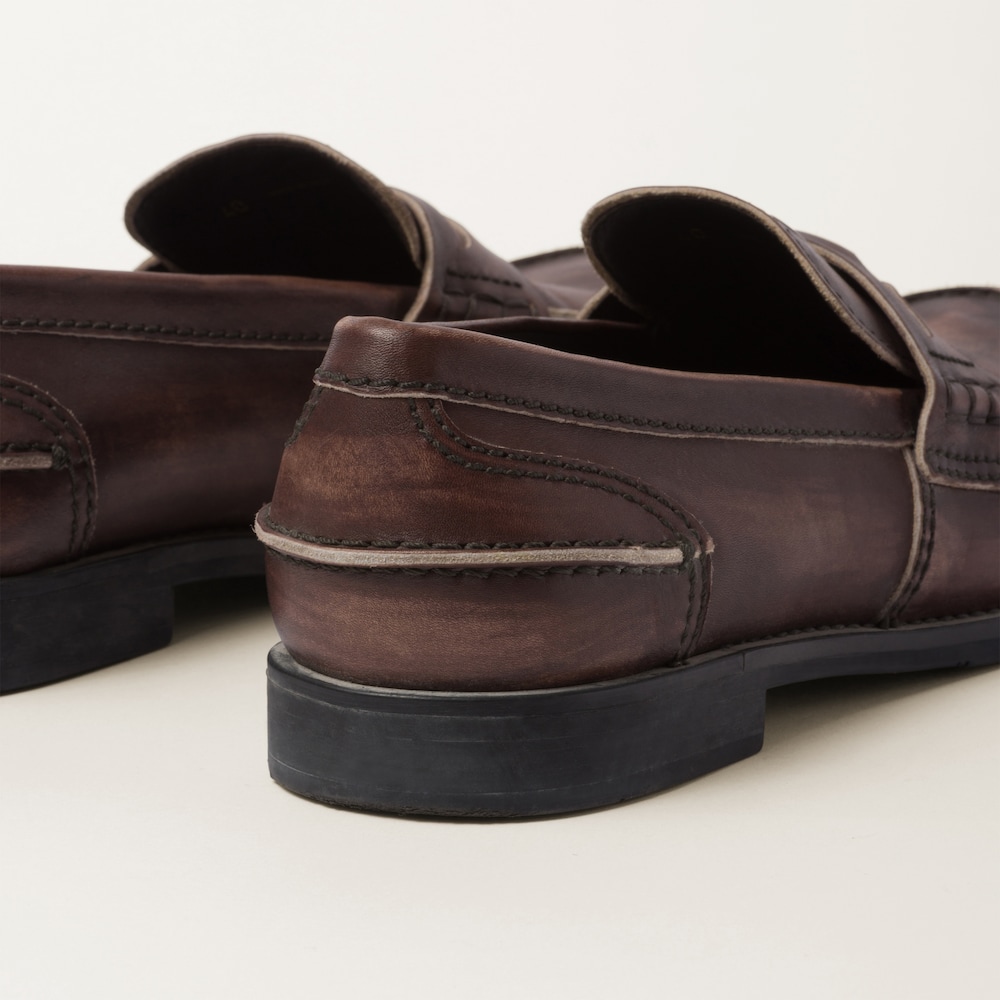 Miu Miu Vintage-effect leather penny loafers Ebony