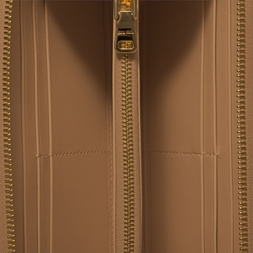 Miu Miu Large matelassé nappa leather wallet Caramel