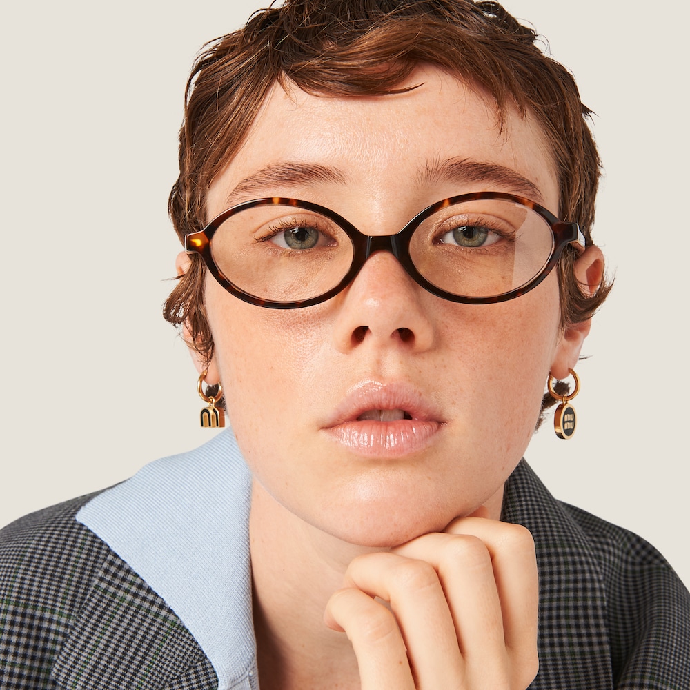 Miu Miu Set of enameled metal earrings Black