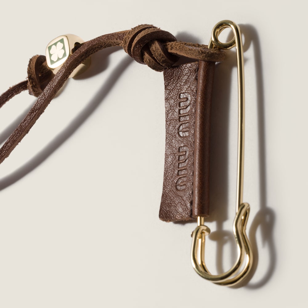 Miu Miu Metal and leather safety pin brooch Tobacco