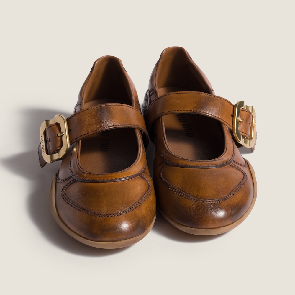 Miu Miu Gymnasium leather ballerinas with strap and buckle Cognac