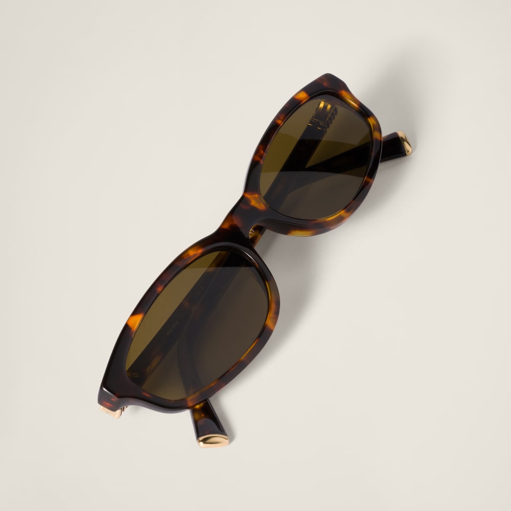 Miu Miu Regard sunglasses - Loden Green Lenses