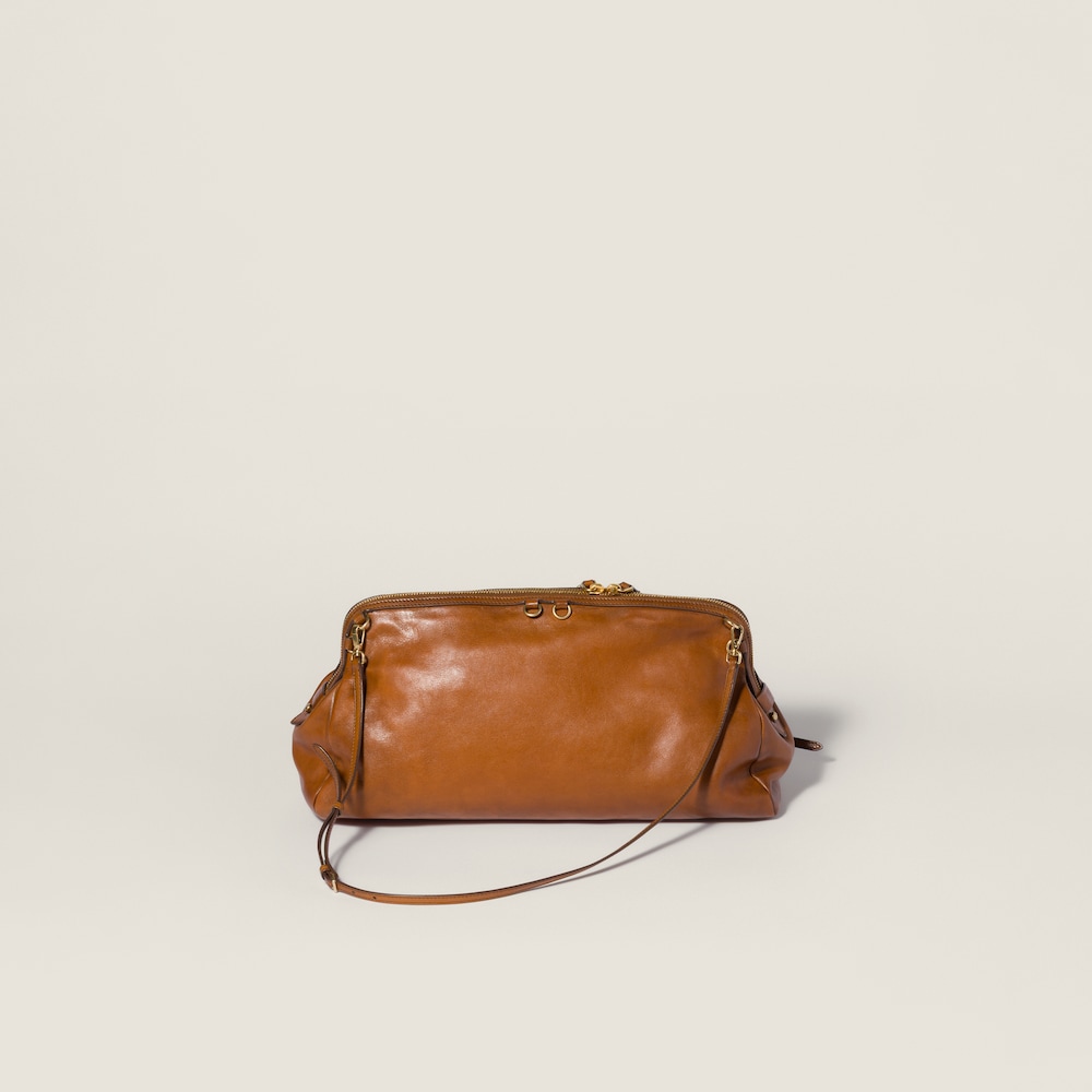 Miu Miu Caprice leather clutch Cognac