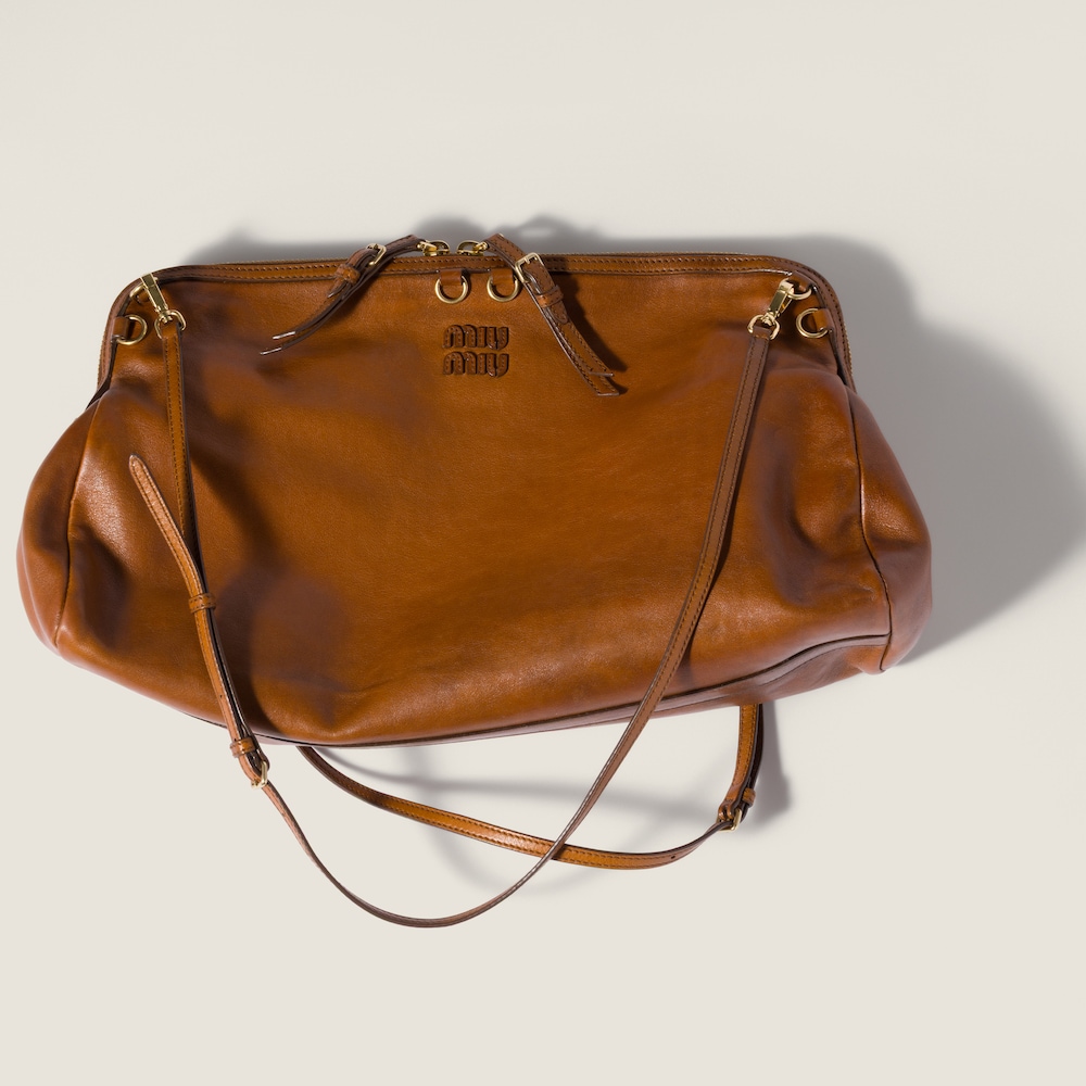 Miu Miu Caprice leather clutch Cognac