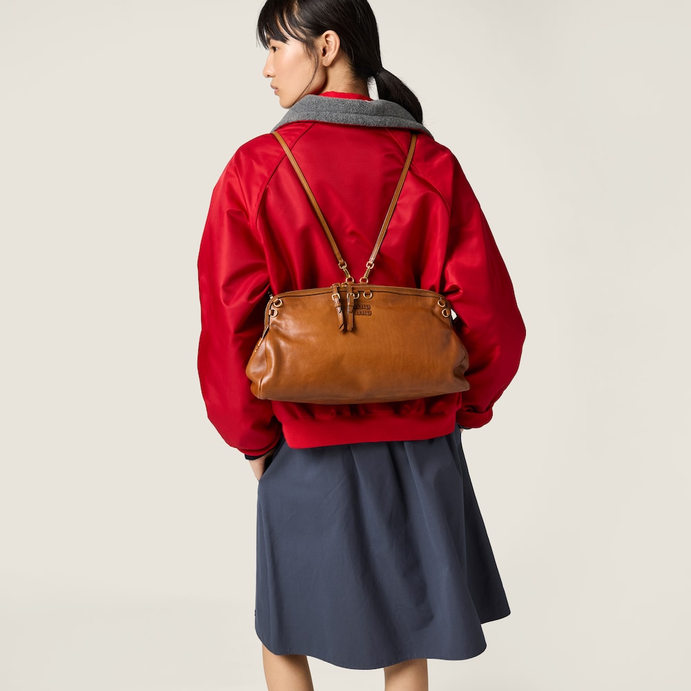 Miu Miu Caprice leather clutch Cognac