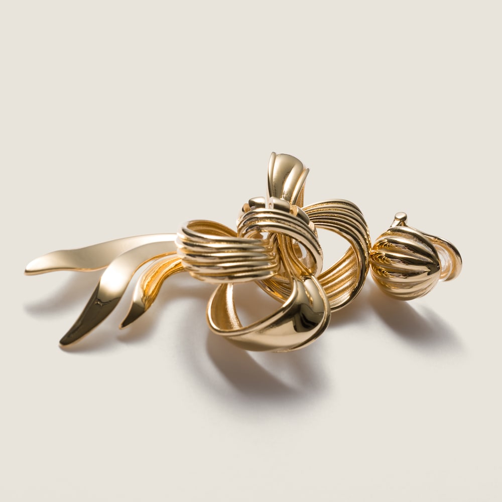Miu Miu Metal bow earrings Gold