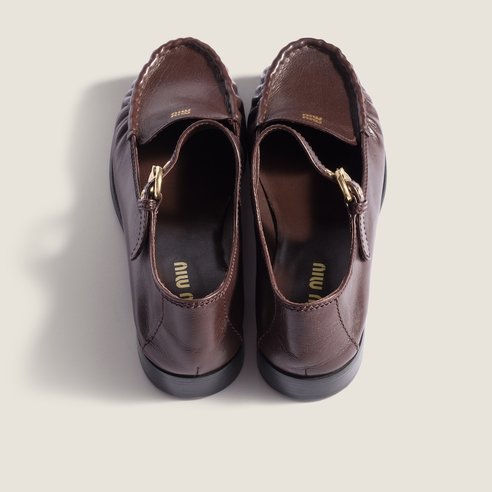 Miu Miu Leather loafers with strap Dark Brown